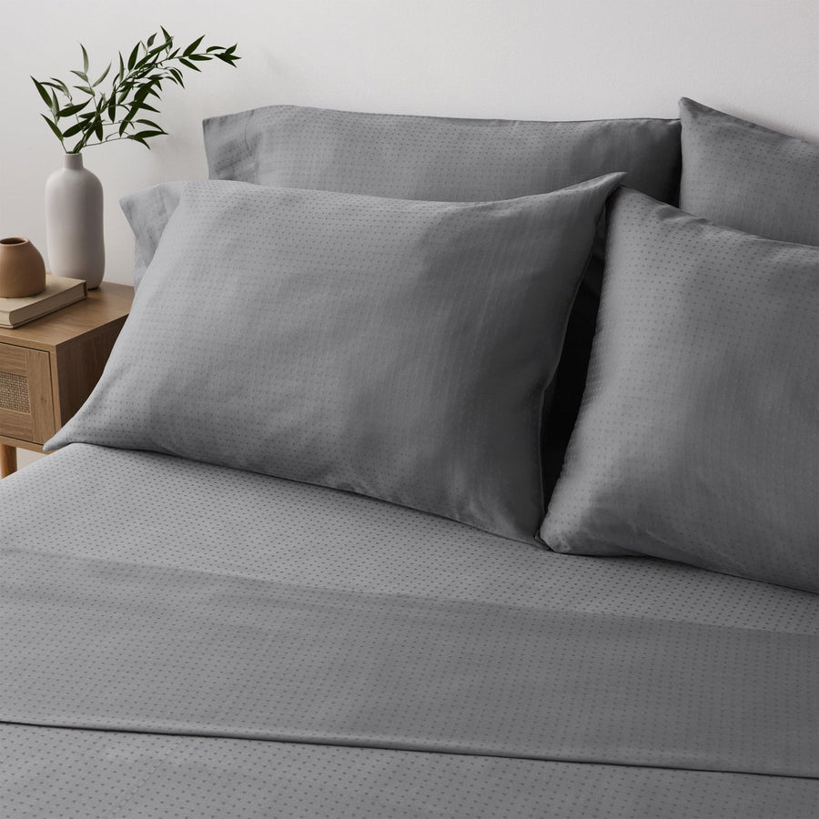 Serene Home cotton sateen sheet set on a bed